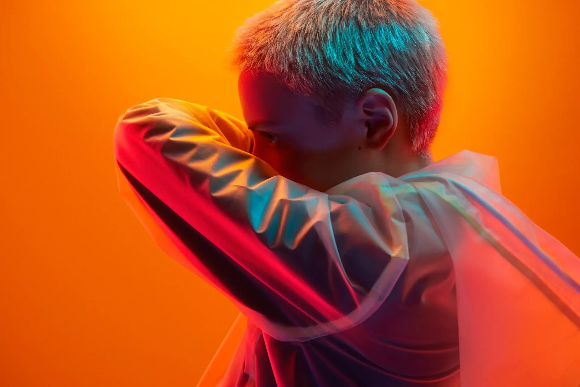 Attentive Futuristic Woman Covering Face With Arm 2023 11 27 05 23 12 Utc