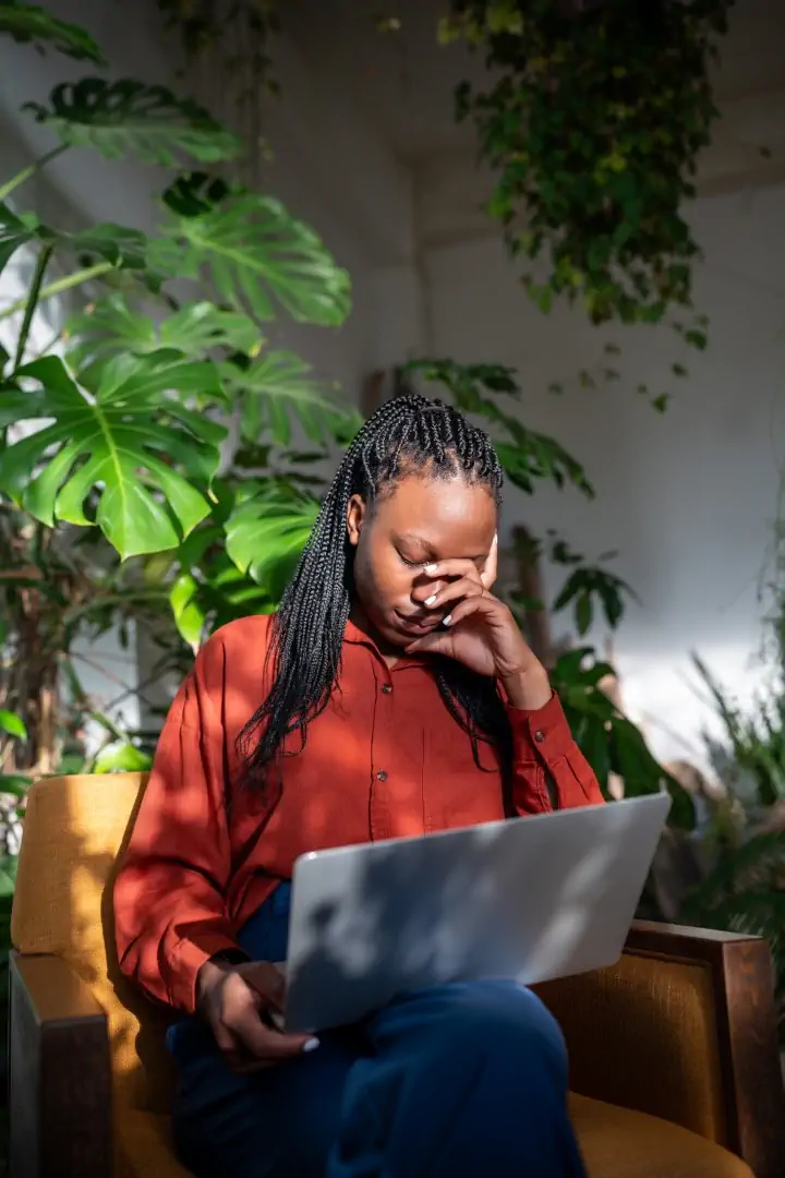 Sleepy Tired Black Woman Freelancer Sitting