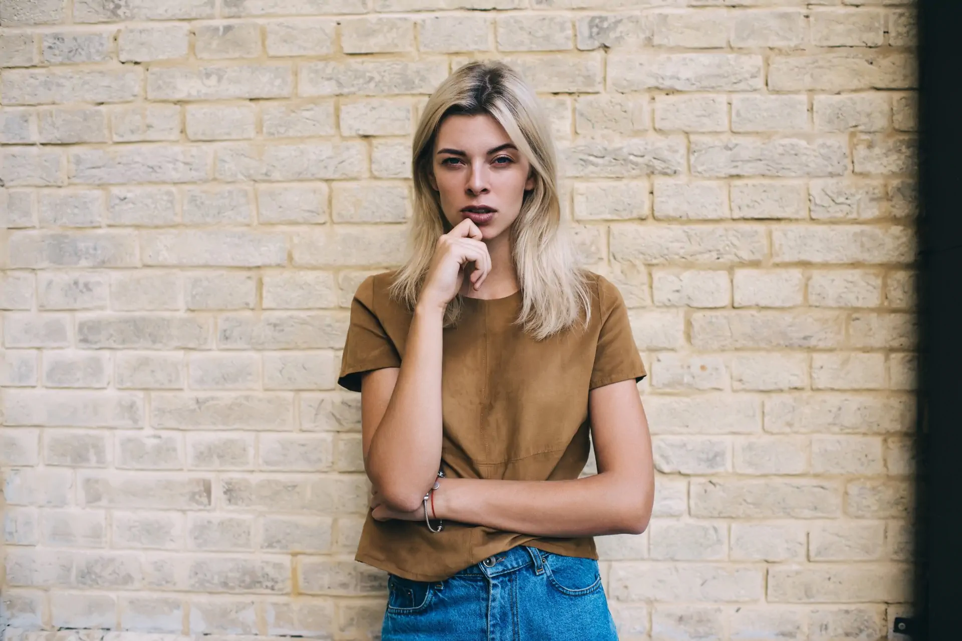 Thoughtful Young Woman Touching Chin And Standing 2024 05 14 17 30 08 Utc