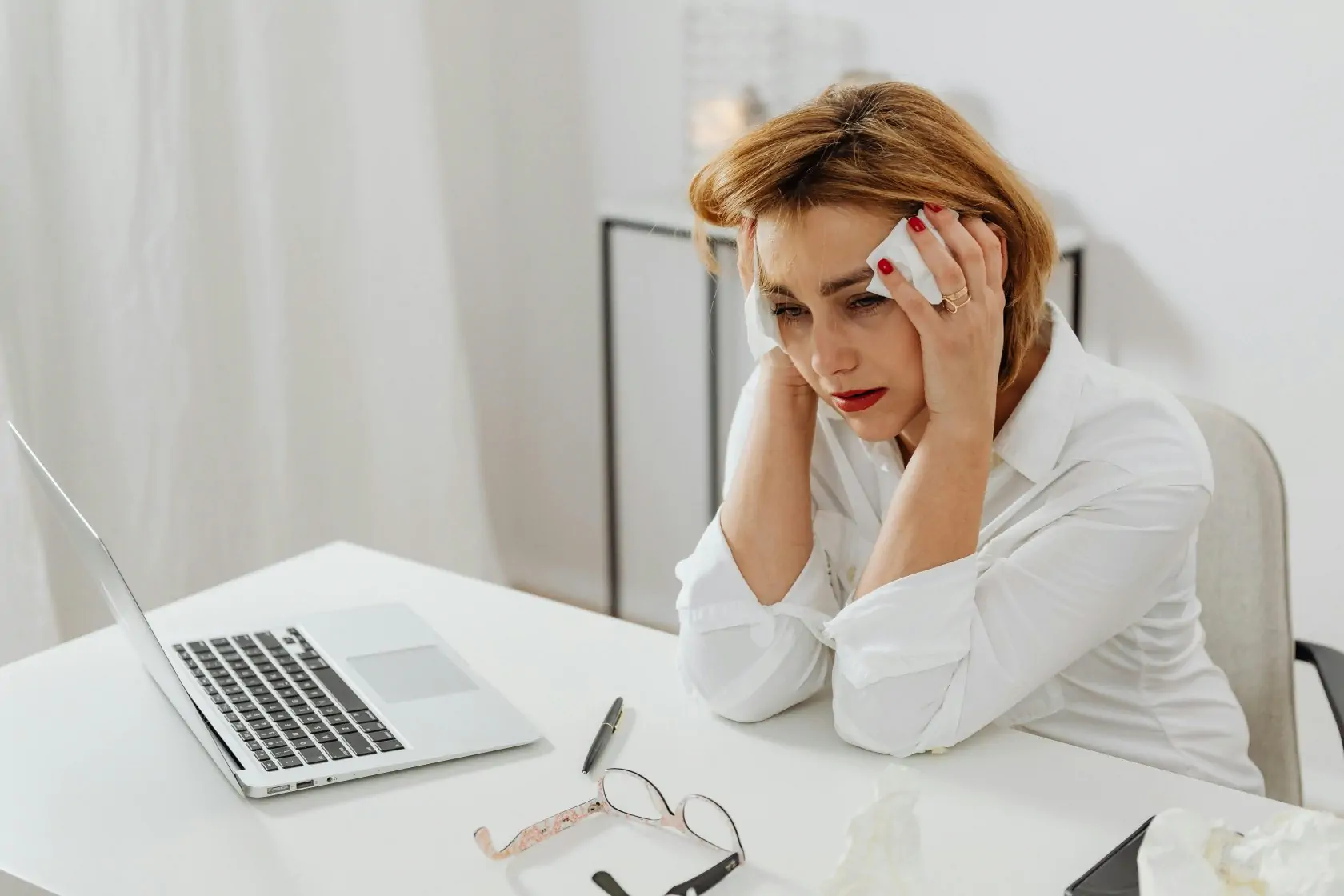 Woman Looking Sad, With Her Head On The Desk 04