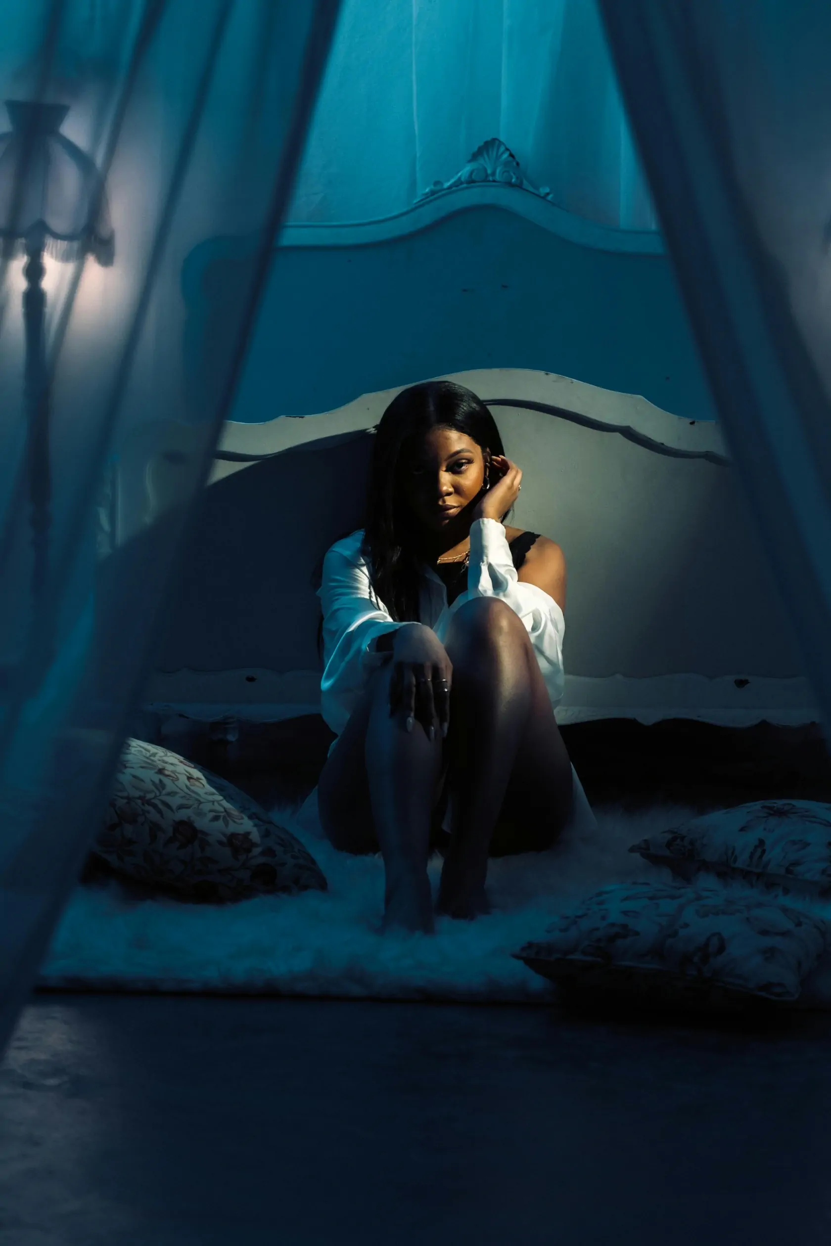 Woman Sitting In Darkness 03