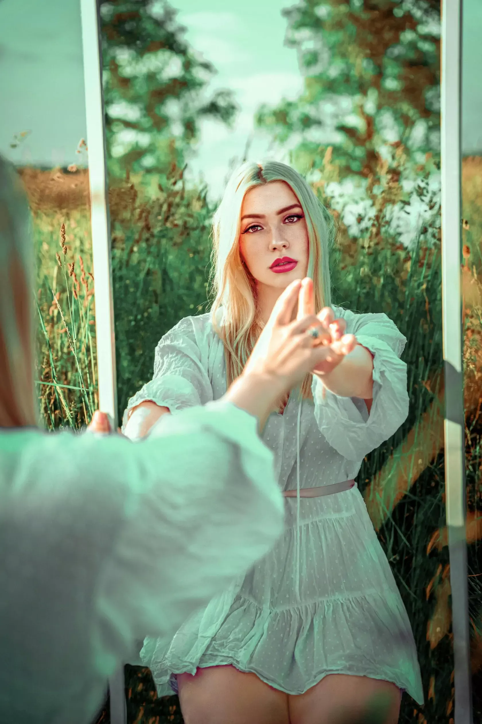 Woman Looking At Her Face In The Mirror 10